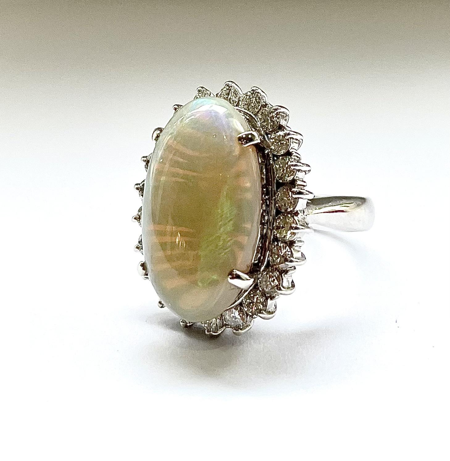Opal — 6.43ct opal · 1.10ct diamond, Platinum